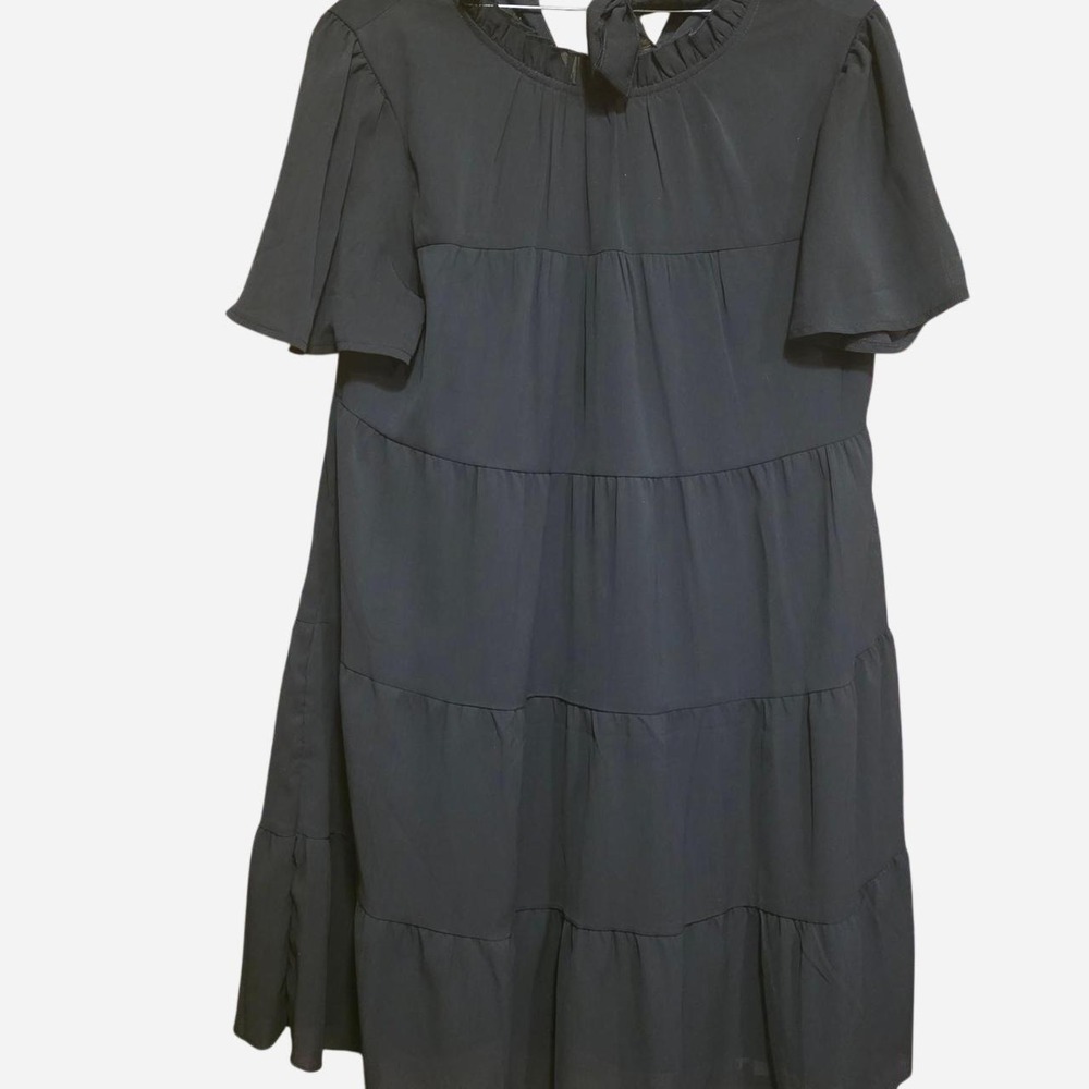 Black tiered romper with tie neck